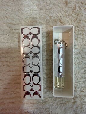 Coach White and Silver Travel  Perfume Keychain
